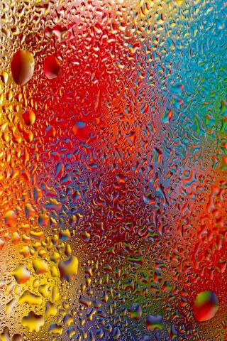 Rainbow Reflections: A Dance of Colorful Drops 🌈💧