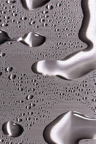 Shimmering Reflections: The Beauty of Metal Water Drops 💧✨