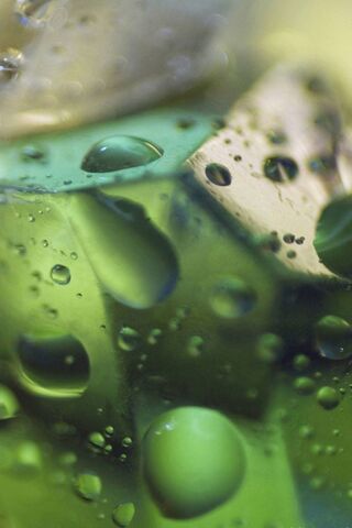 Chilled Refreshment: The Essence of Ice Cube Drops ❄️💧