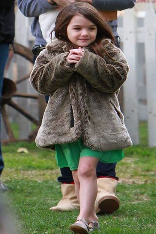 Suri's Stylish Stroll 🌟
