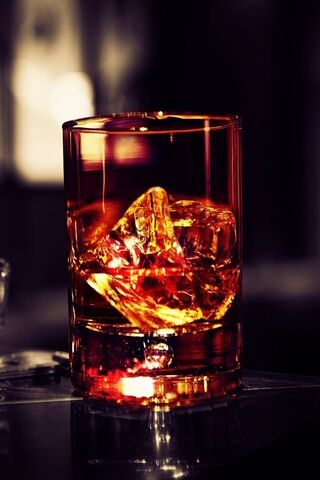 Savoring the Spirit: A Glass of Scotch 🥃✨