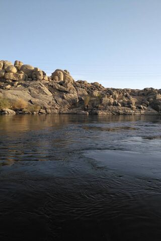Serenity of the Nile: Nature's Timeless Flow 🌊🌅