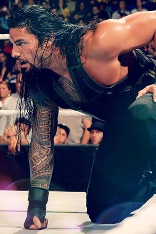 The Powerhouse of the Ring: Roman Reigns in Action! 💪