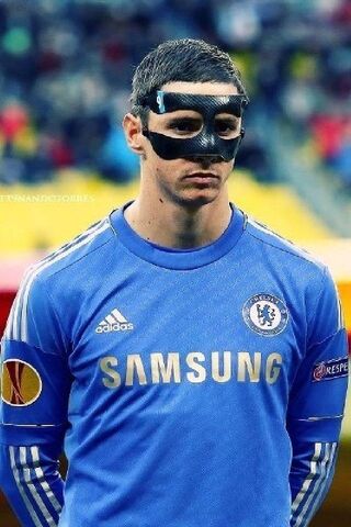 The Masked Striker: Fernando Torres in Action ⚽️🖤