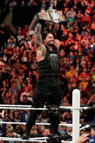 Champion's Glory: Roman Reigns Raises the WWE Title! 🏆🔥