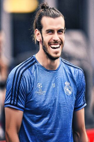Smiles of a Champion: Gareth Bale in Action! ⚽️😊