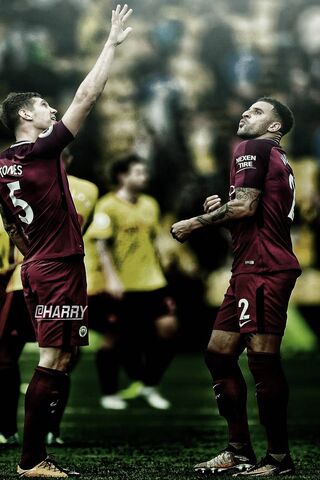 Victory in Motion: Walker and Stones Celebrate!