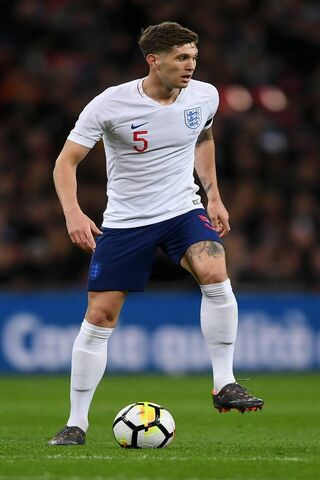 Stones in Action: A Defender's Dance ⚽️