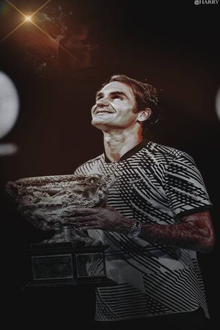 The Champion's Glory: Roger Federer Celebrates Victory 🏆✨