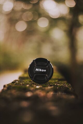 Lens Cap Serenity: A Nikon Moment 📸✨