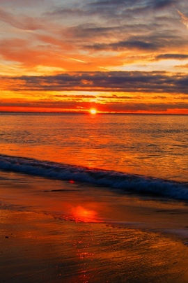 พระอาทิตย์ตกที่ชายหาด
