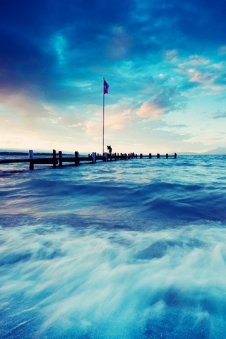 Waves Hitting The Pier