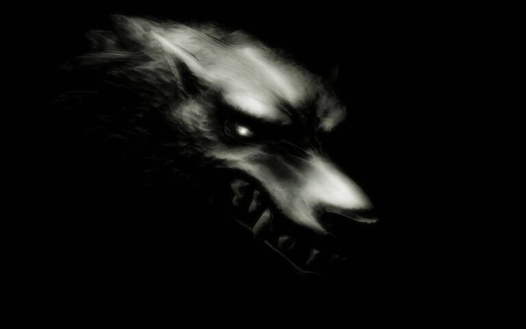 Premium AI Image  A dark wolf with a full moon in the background