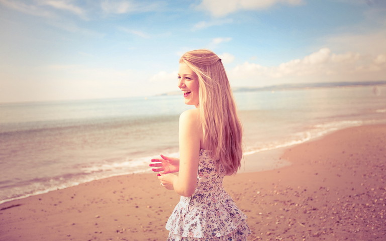Blonde girl in bikini on the beach - wide 4