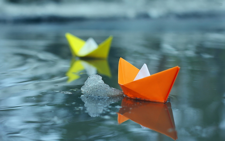 Paper Boats On Icey Lake.
