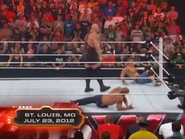 John Cena and The Rock attacking Big Show