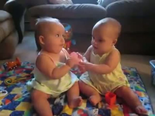 Twins fighting over cell phone