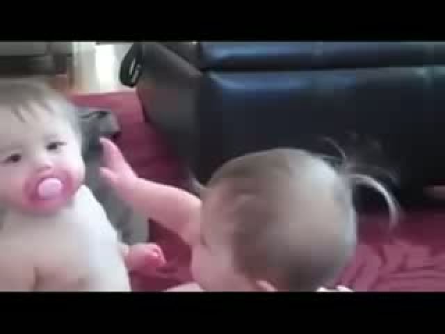 2 kids fight over pacifier