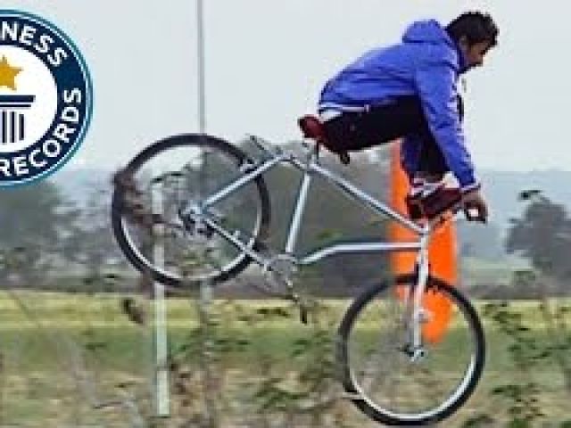Longest bicycle stoppie (feet on handlebars)