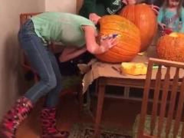 Girl Gets Her Head Stuck In Pumpkin