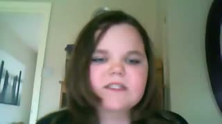 Girl getting annoyed because she can't sing the right notes