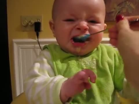 Baby hates his new food