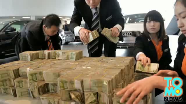 Man buys car with 120,000 one-yuan bills in China